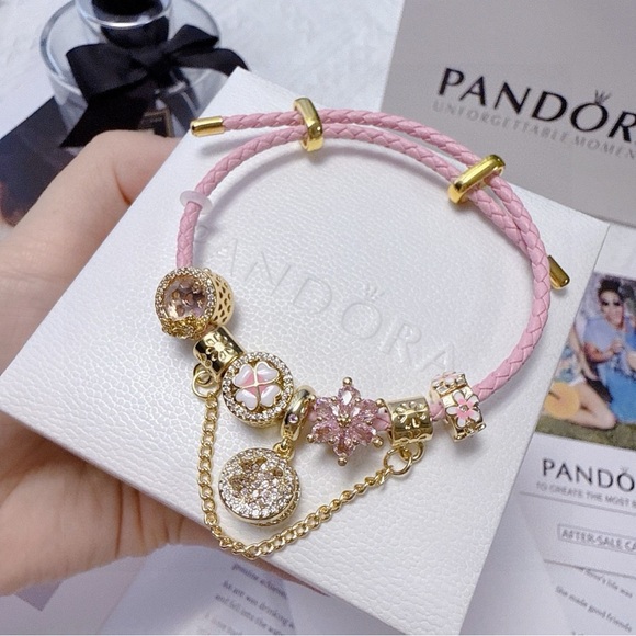 Pandora Jewelry - Pandora Pink Leather Bracelet with Gold Charms